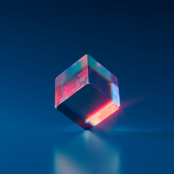 an NFT named equilibrium: a transparent cube with colorful refraction.